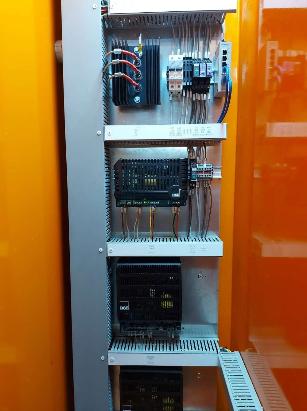 The Inside Of A Electrical Cabinet With A Lot Of Wires Coming Out Of It — Great Energy in Cairns, QLD