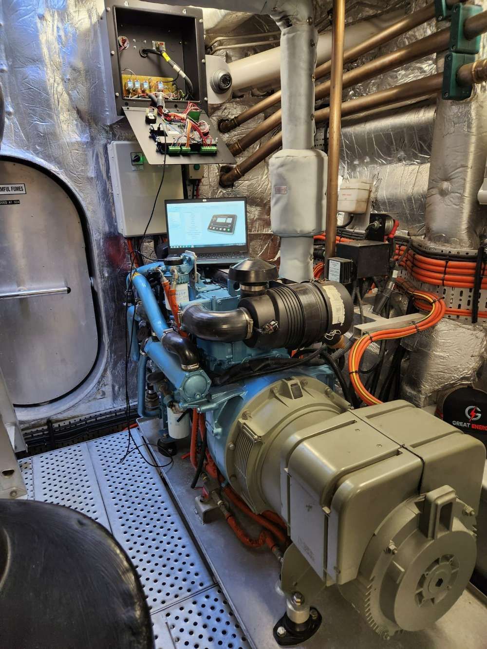 A Large Engine Is Sitting In The Engine Room Of A Boat — Great Energy in Port Douglas, QLD