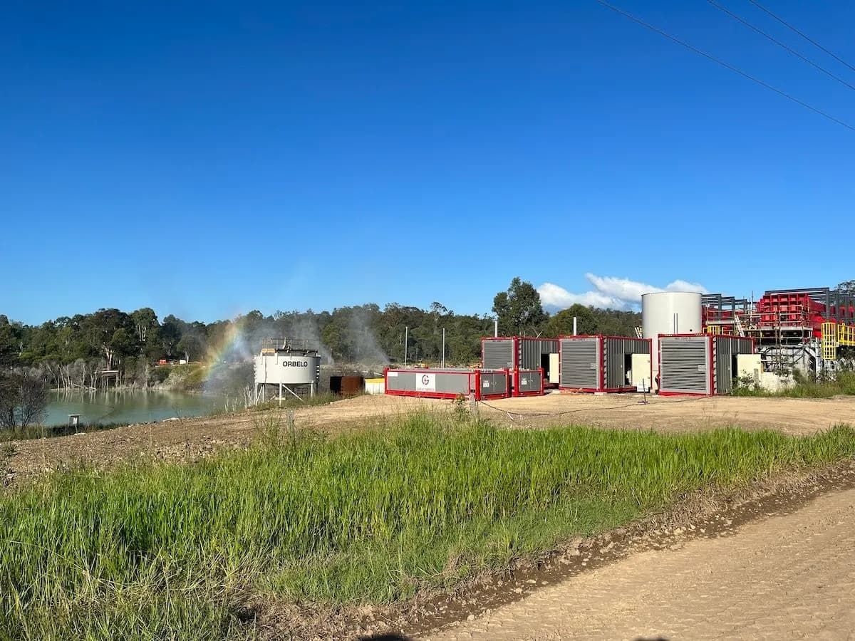 There Is A Rainbow In The Sky In The Background Of This Picture — Great Energy in Portsmith, QLD