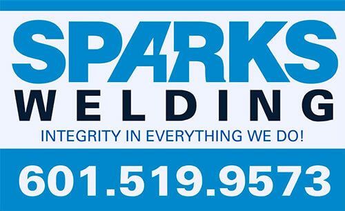 Business sign for Sparks Welding featuring their phone number, 601-519-9573, and slogan