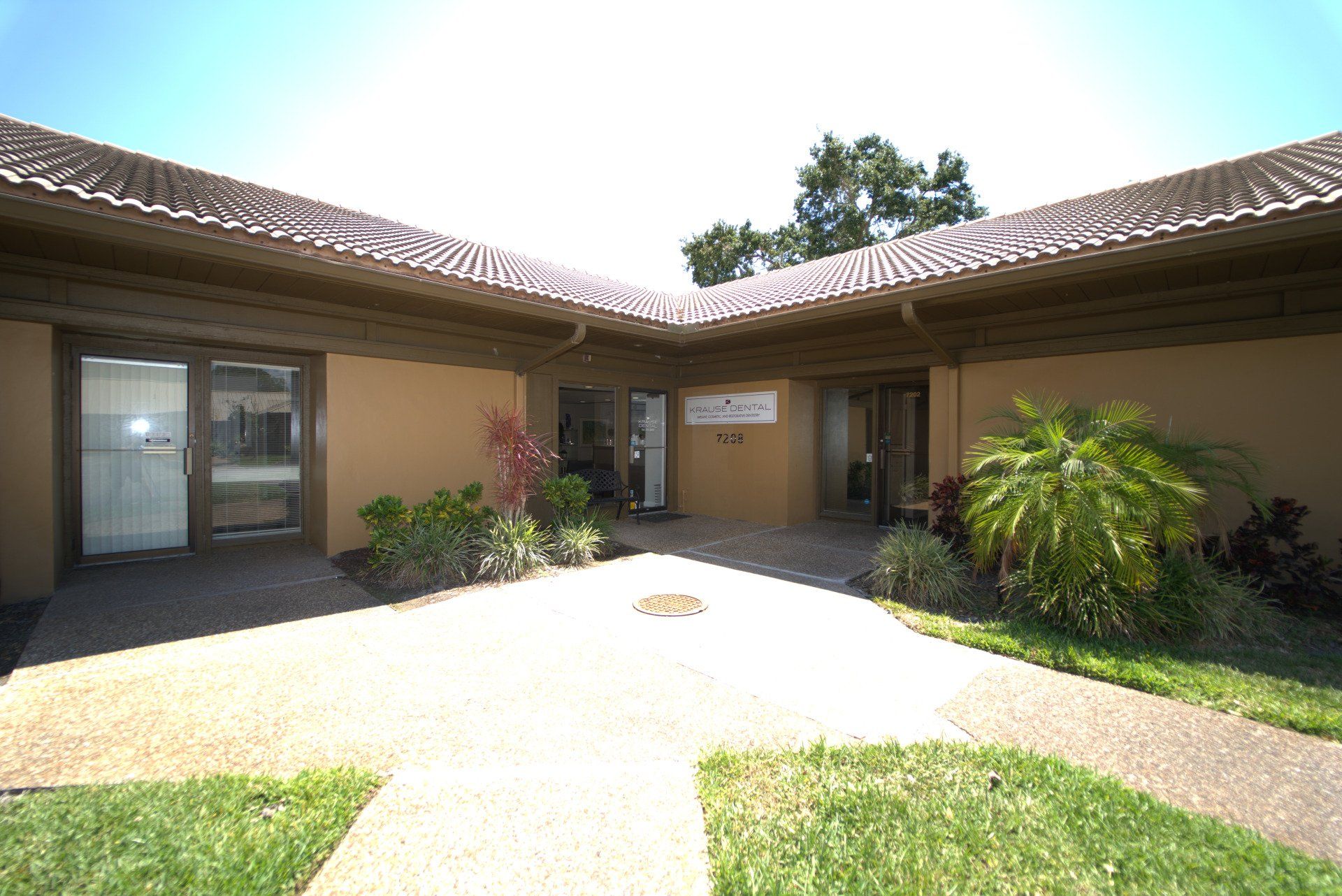 A large building with a walkway leading to it