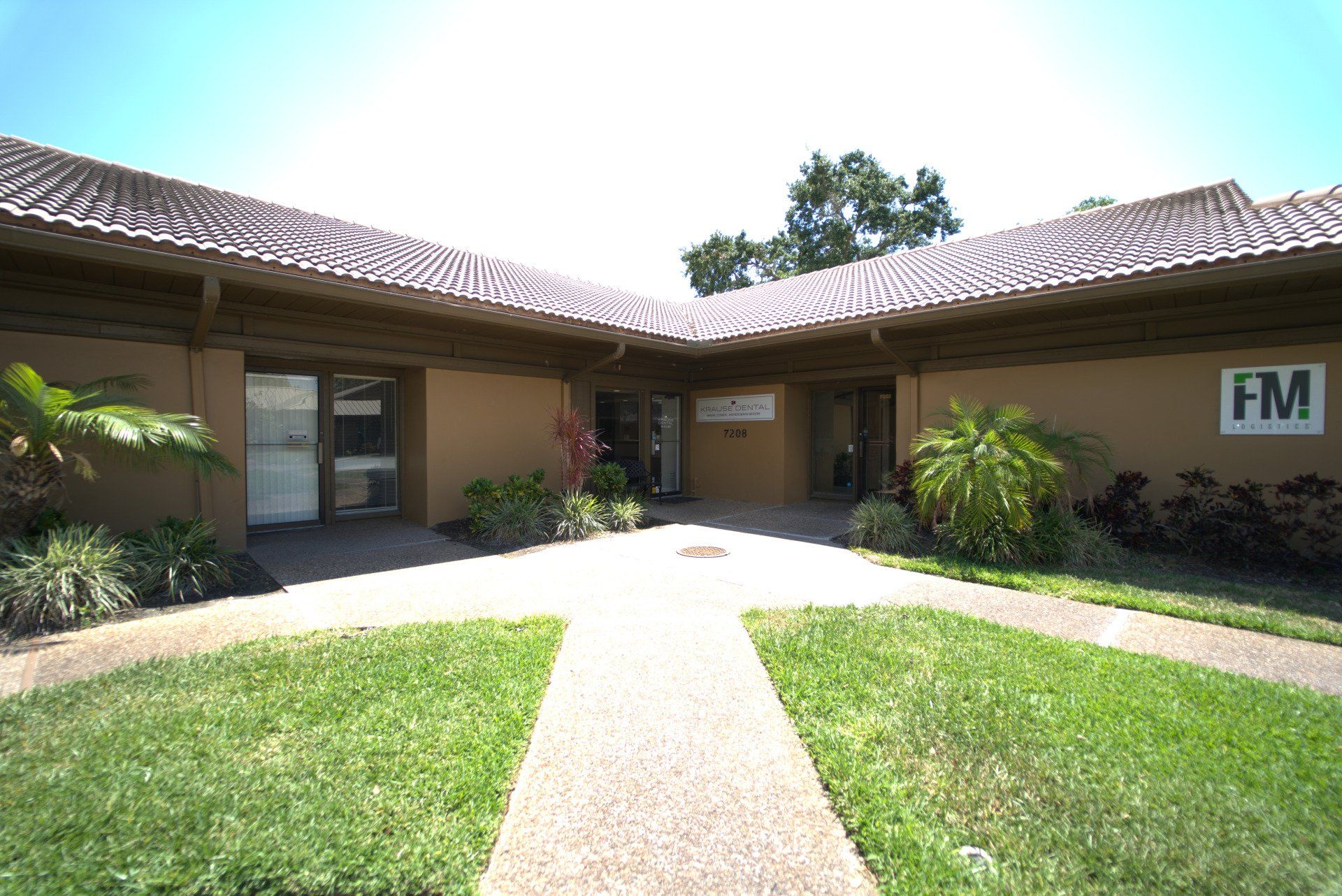 A building with a sign that says fm on it