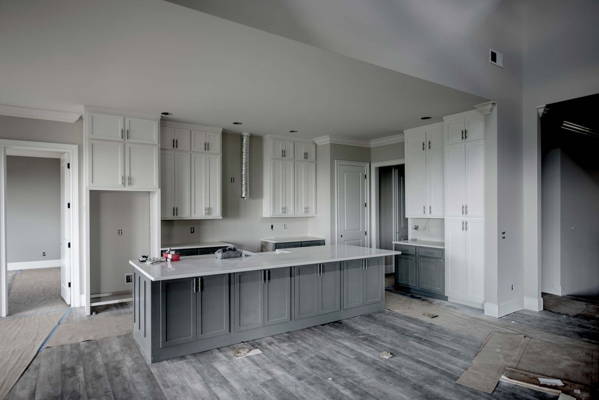 Kitchen with gray cabinets and white countertops — Peterborough, ON — Comtois Custom Creations