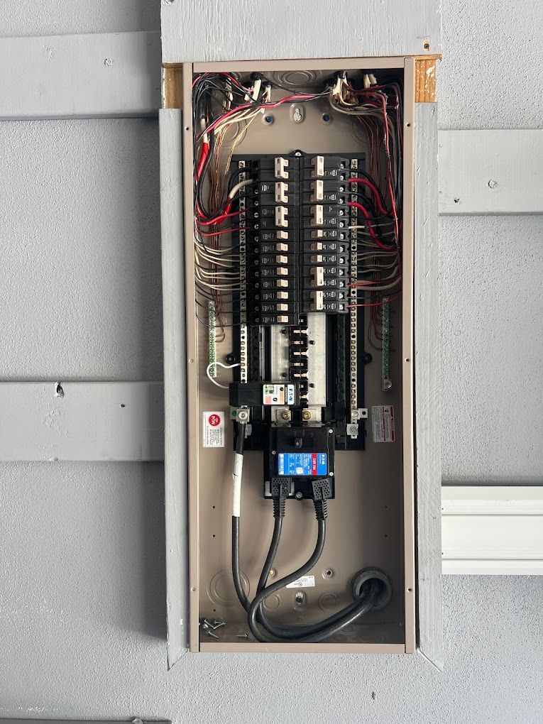 The inside of a electrical box with the word up on it