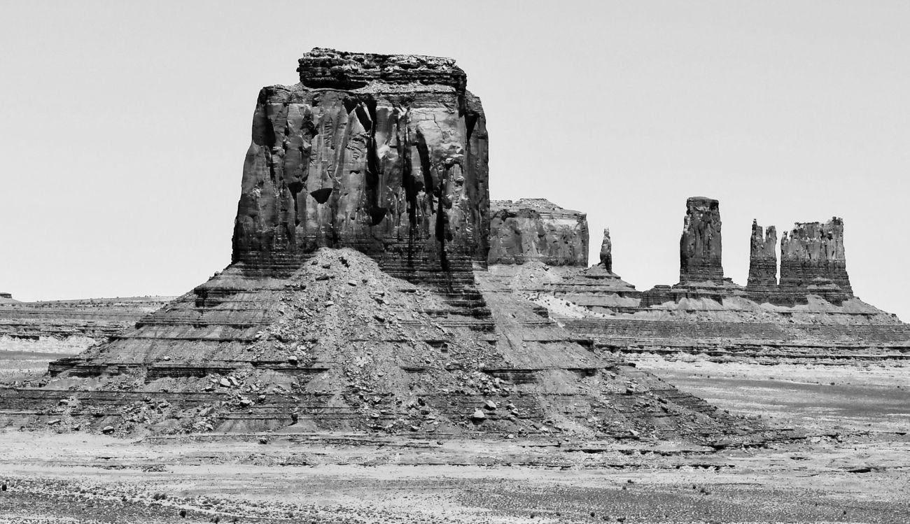 Monument Valley buttes in a desert landscape.