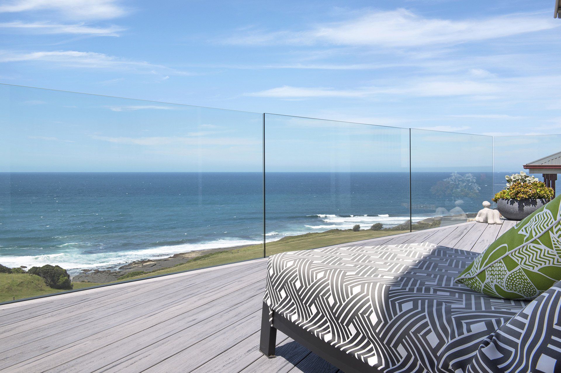 deck with frameless glass railing