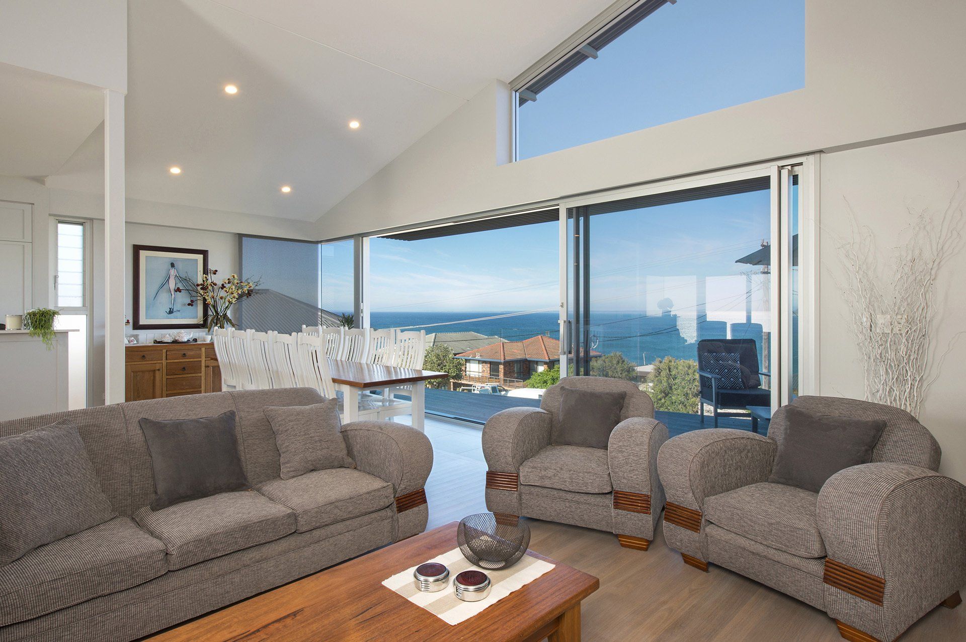 dining room and sitting room at Elanora Gerroa