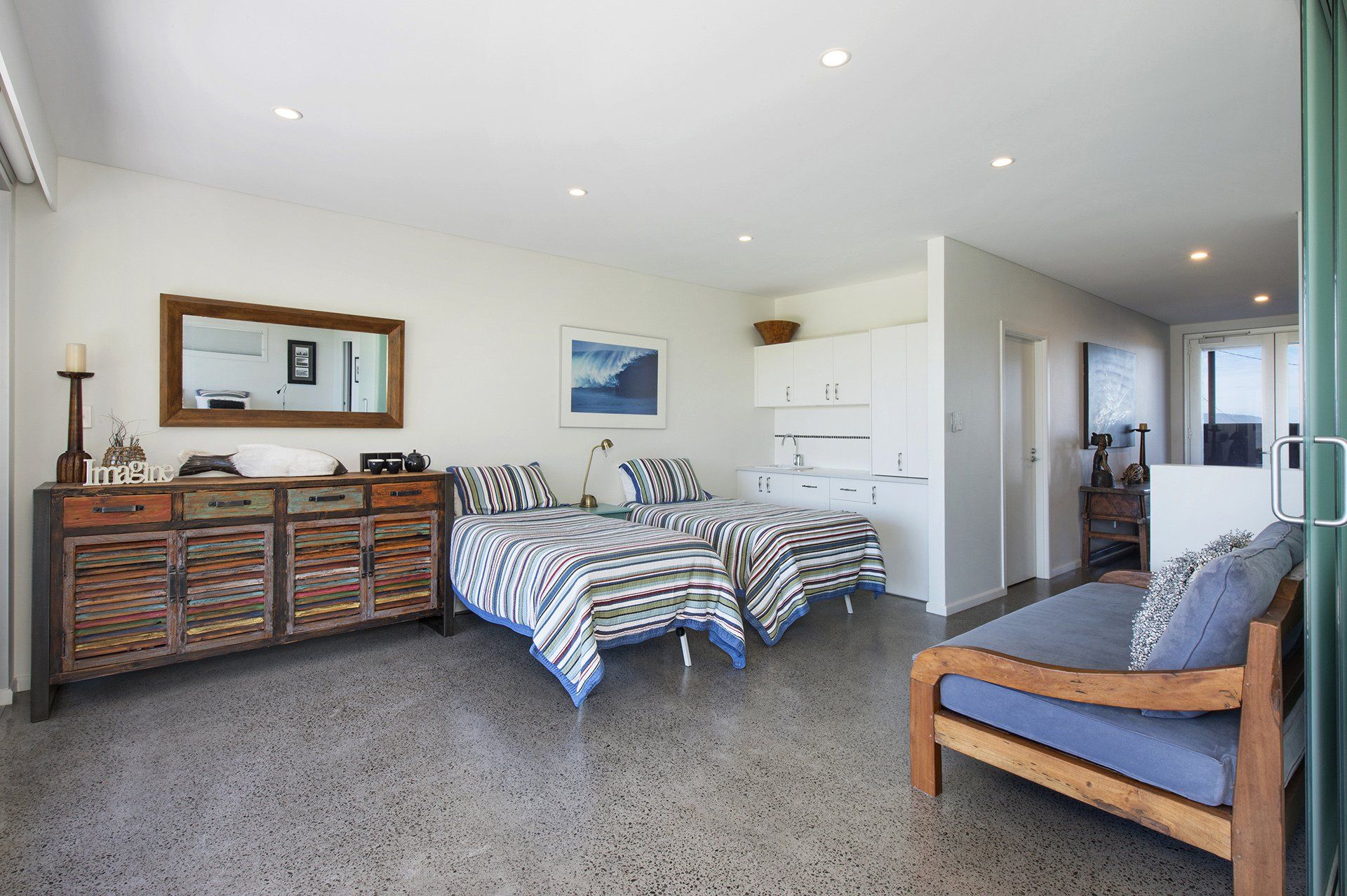 two beds inside a bedroom