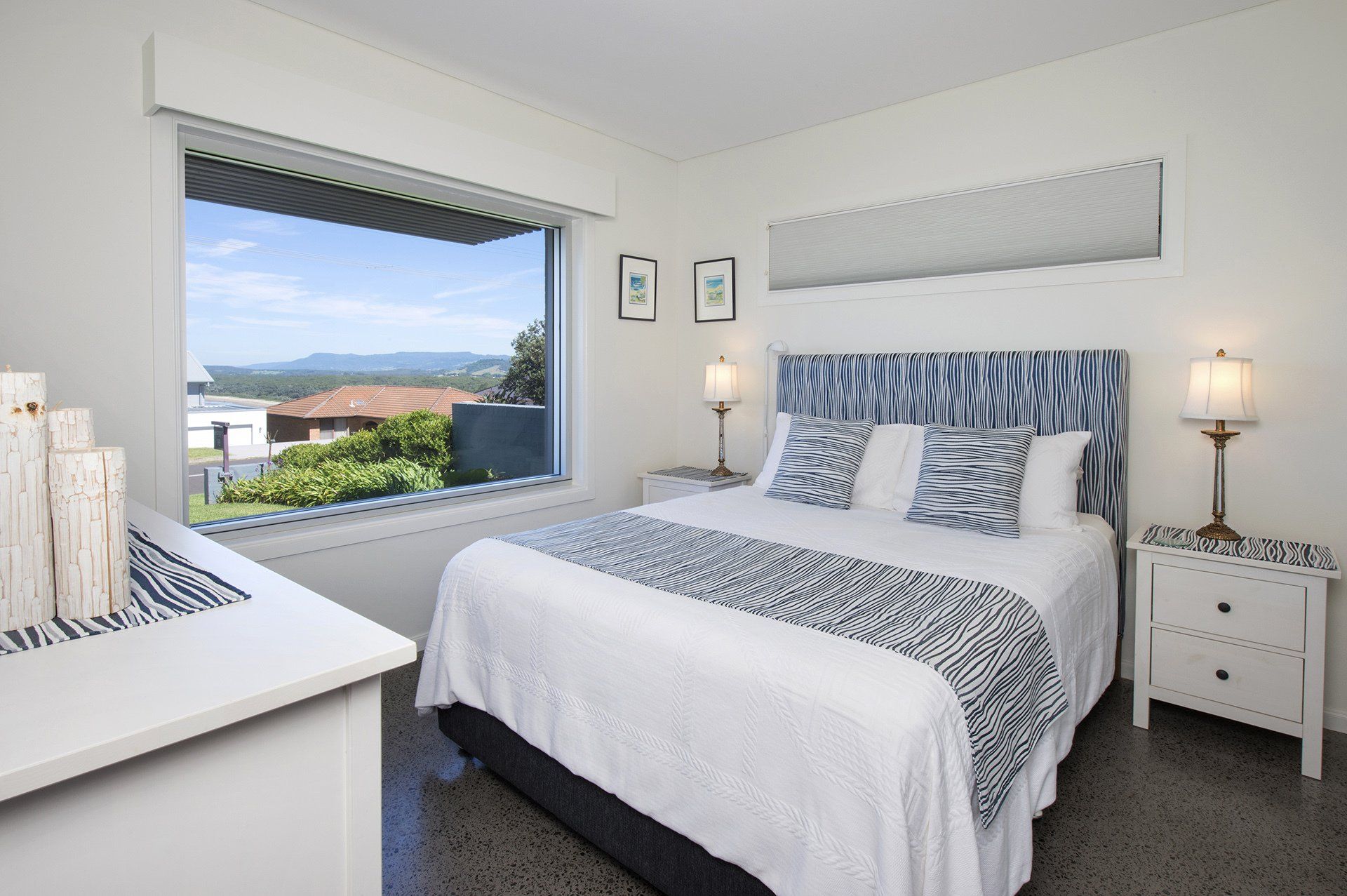 a modern bedroom with spectacular views