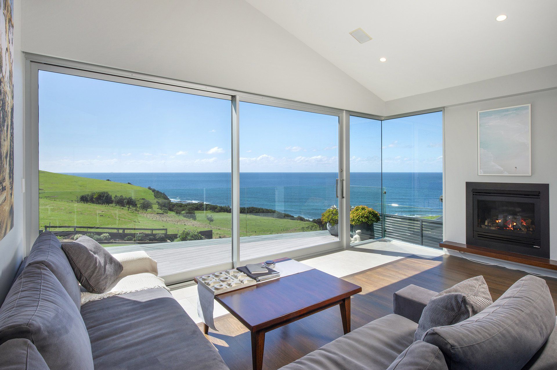 sitting room with stunning views of the water and farmland