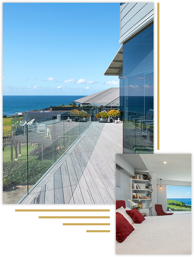 a deck enclosed by frameless glass balustrades