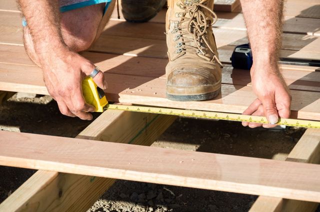 Why Hire a Professional Deck and Fence Builder vs DIY