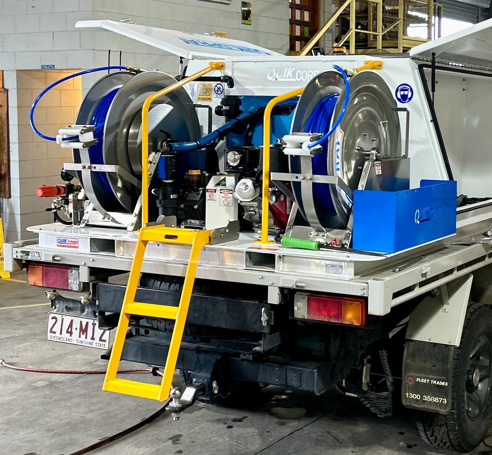Work car with equipment and hose wheels on the back — I & J Mechanical in Deeragun, QLD