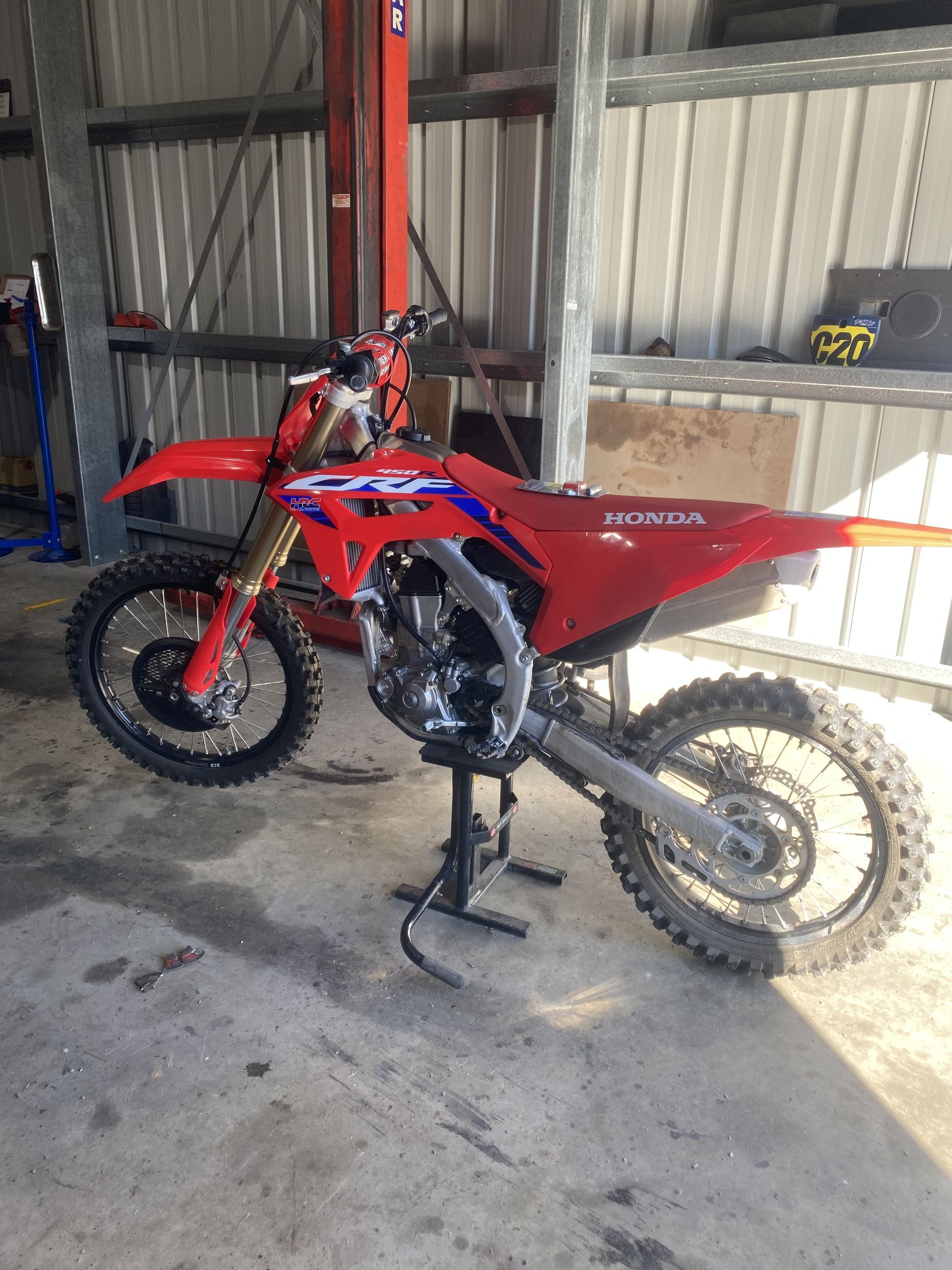 Red Honda Bike on Stand — I & J Mechanical in Deeragun, QLD