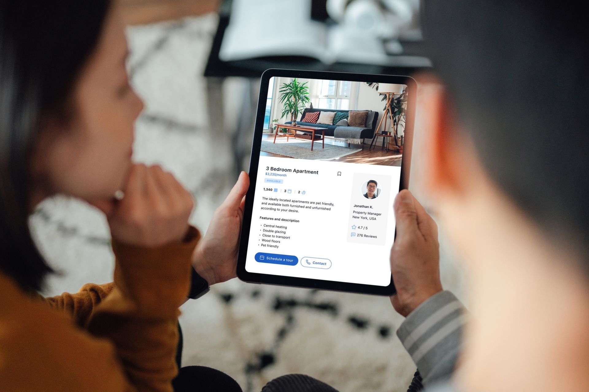 Couple looking at real estate listing photography