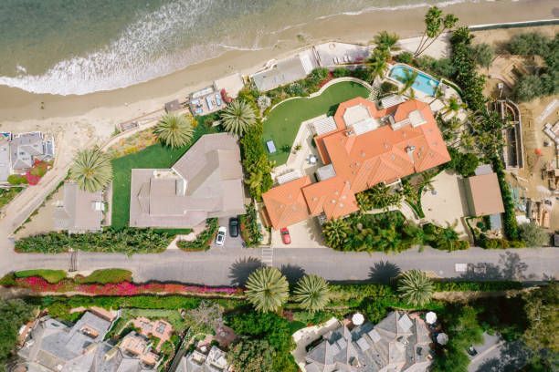 Aerial view over houses along the beach taken by Drone Photographer in Los Angeles, CA.