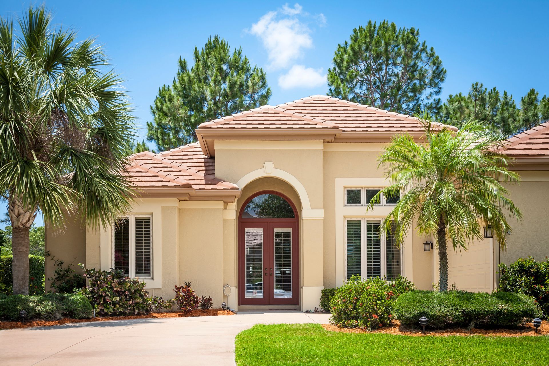 Elegant new upscale home with tiled roof & palm tree | Photographer | Los Angeles