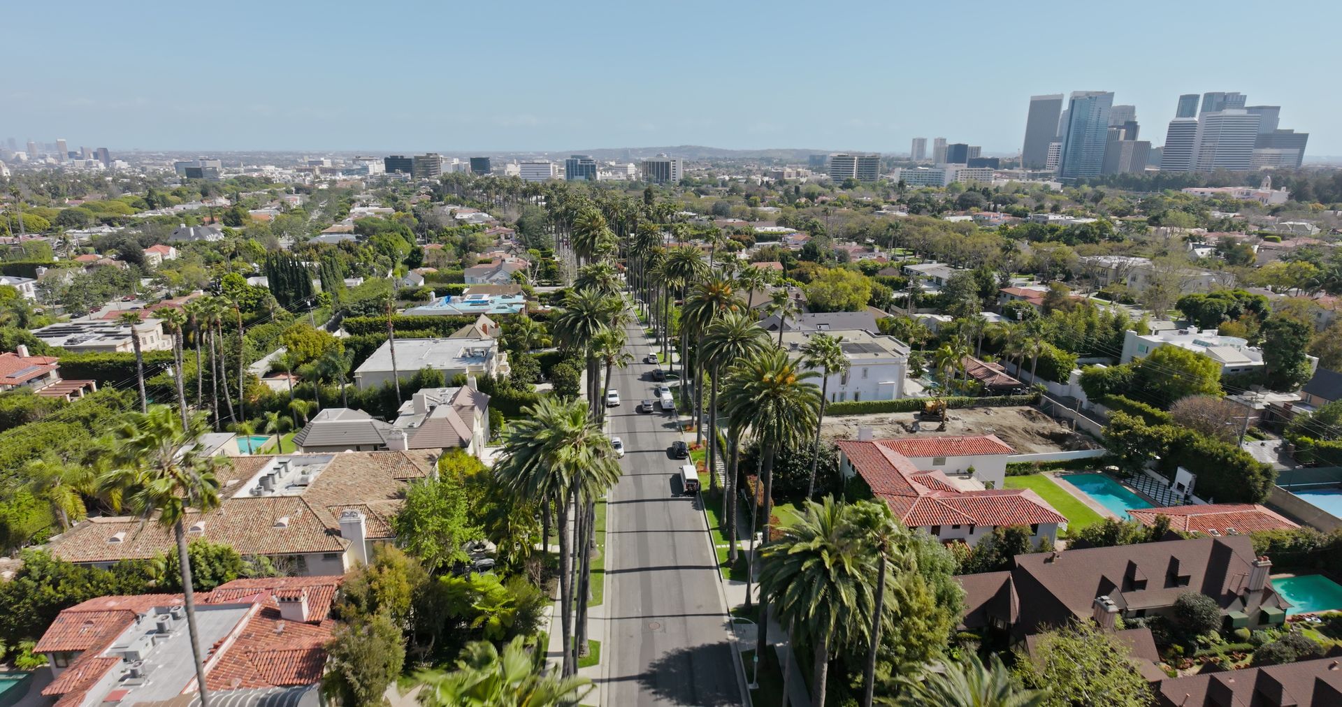 Aerial shot of a street in Los Angeles overlooking the cityscape.