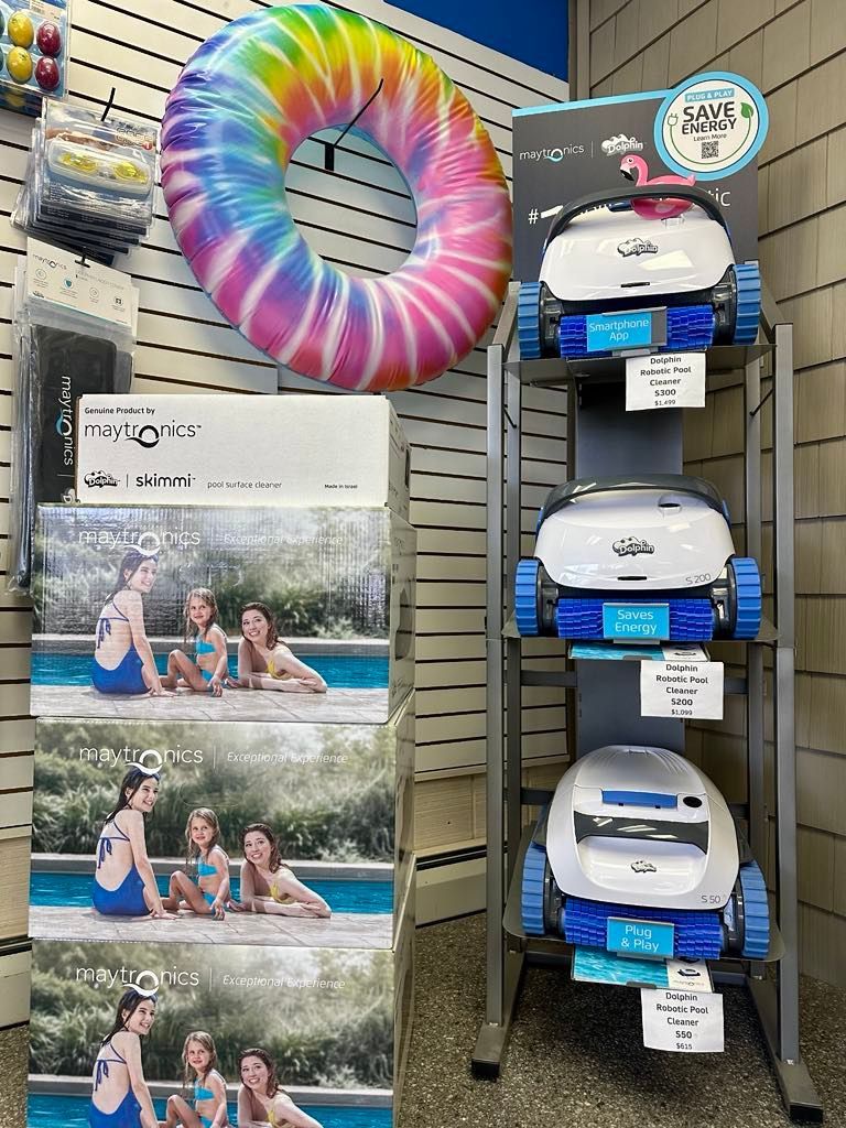 A display of swimming pool equipment in a store.