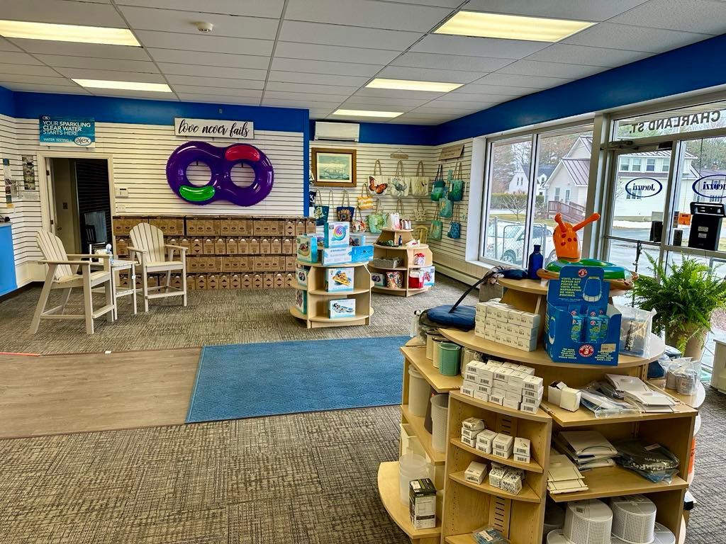 A store filled with lots of shelves and chairs.