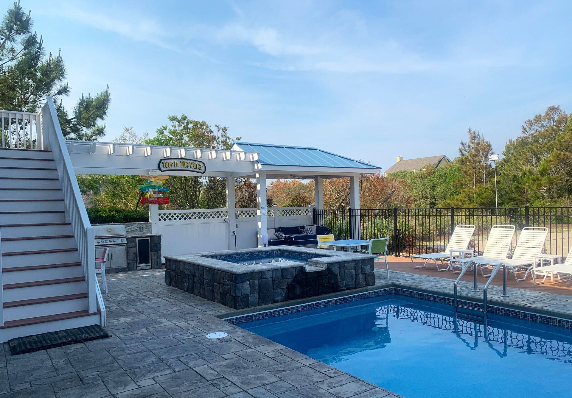 Pergola, hot tub, pool. The pergola was built by Patterson Homes and Construction