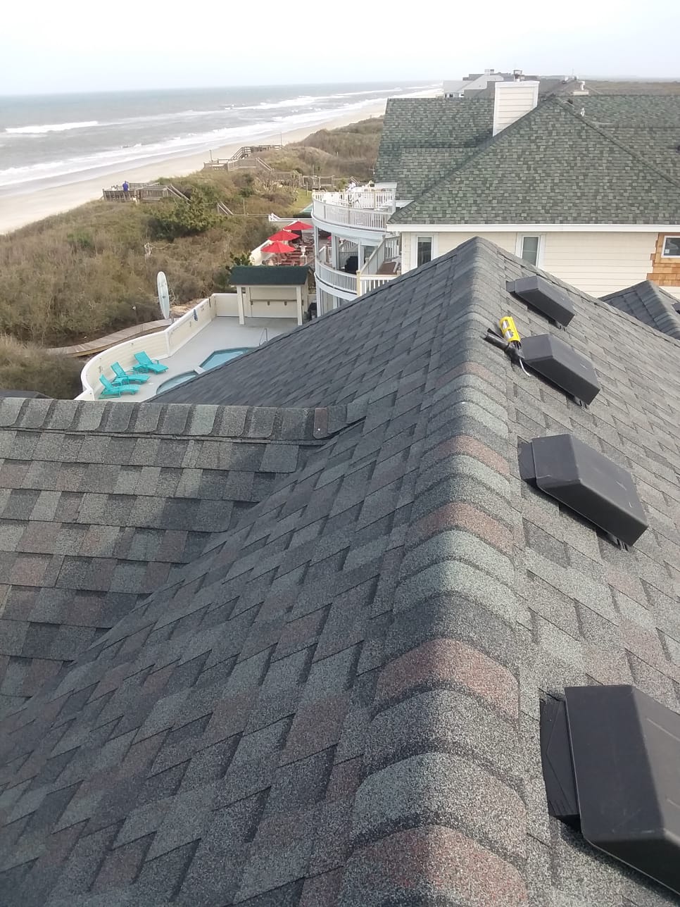 Roofing job completed by Patterson Homes and Construction, Corolla, NC