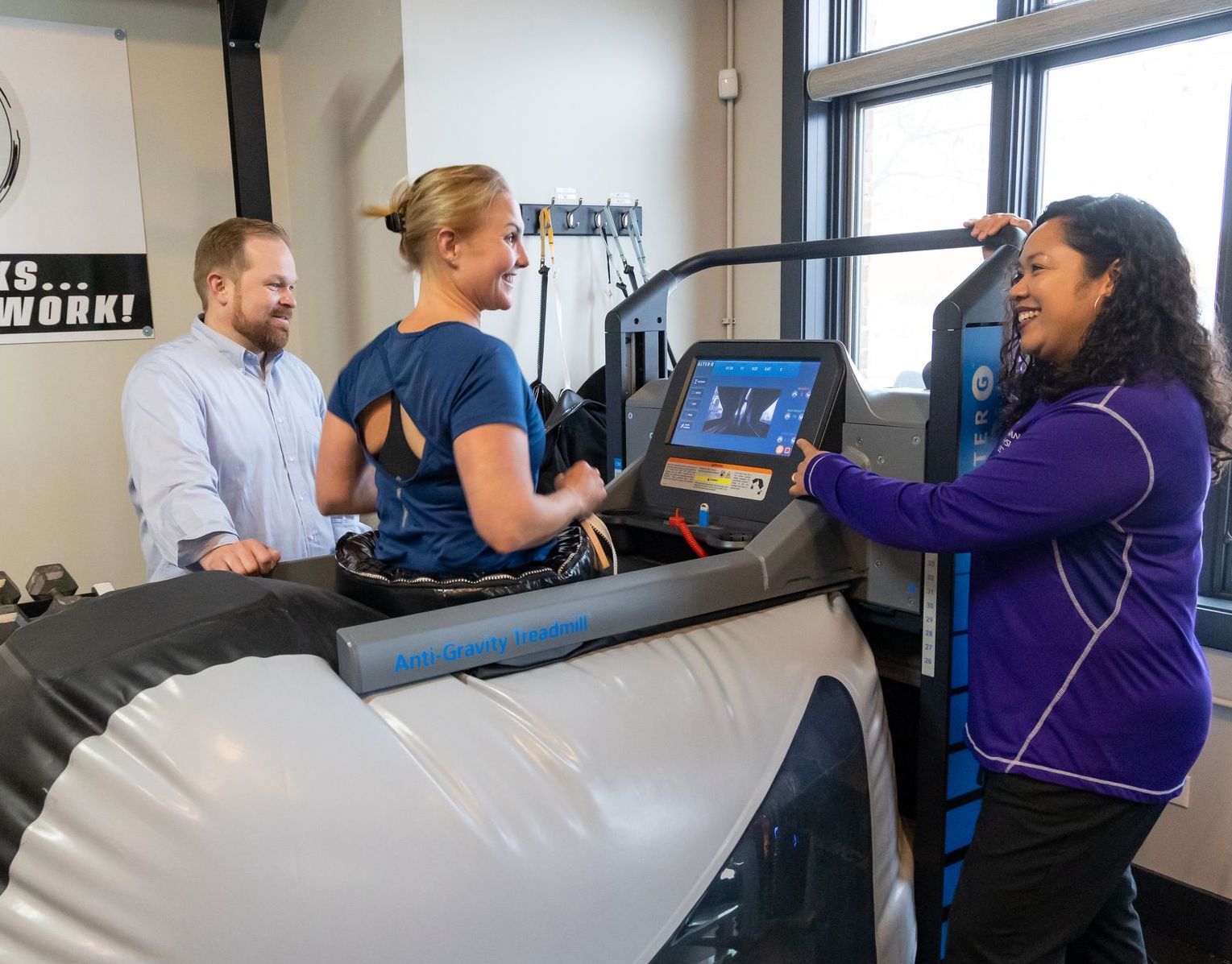 anti-gravity treadmill therapy helping a woman walk