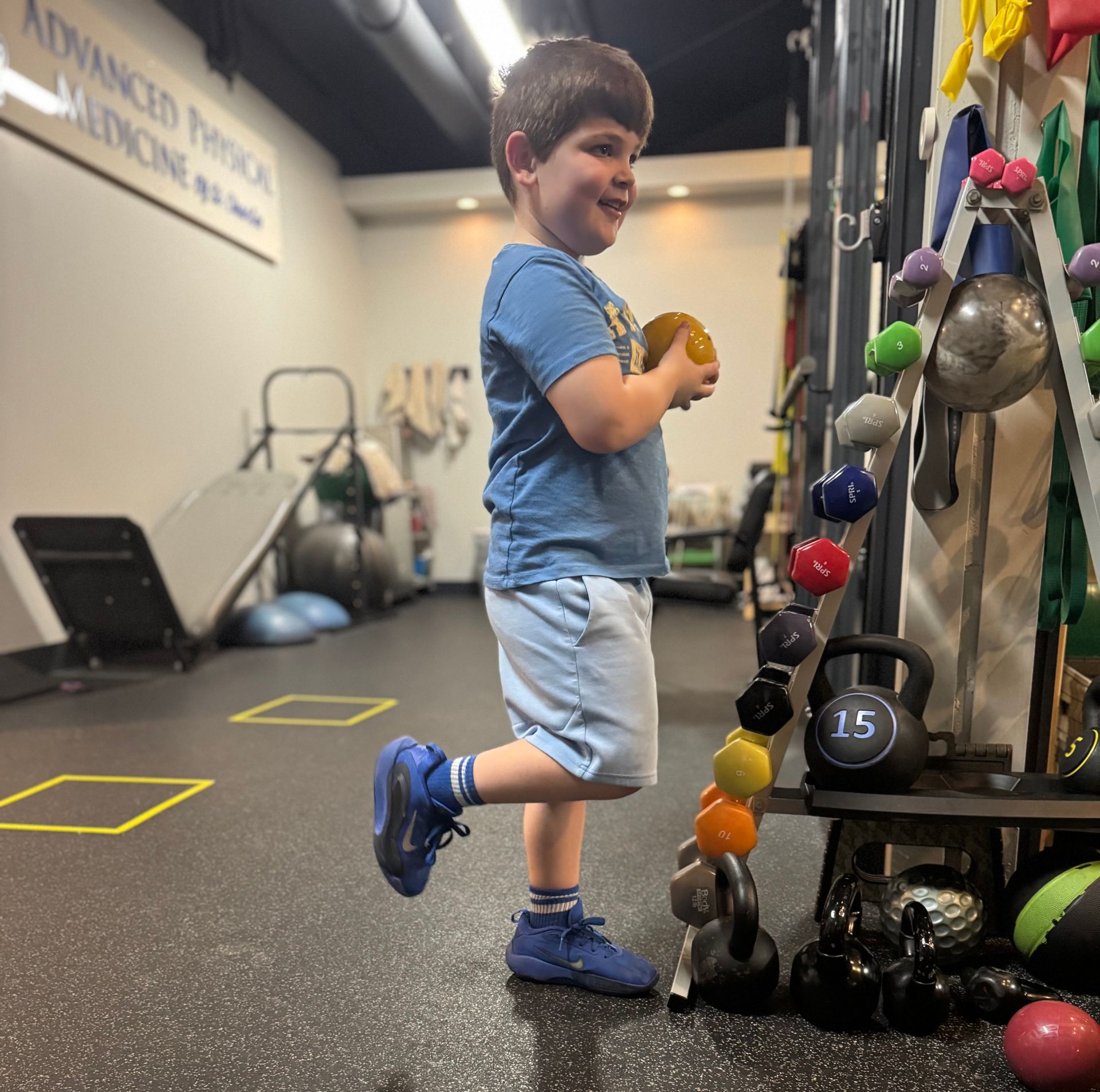 a young athlete following a youth-focused treatment plan at APM to help him recover faster