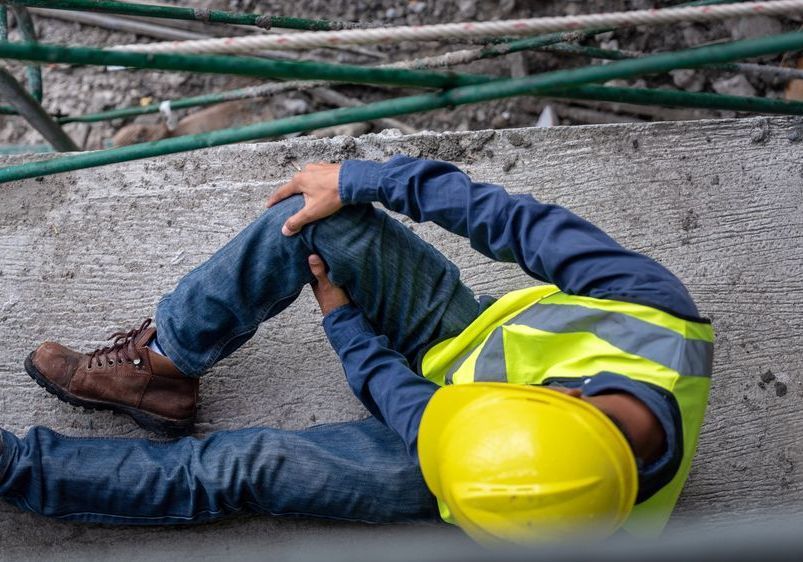 worker realizing he needs workers' comp physical therapy