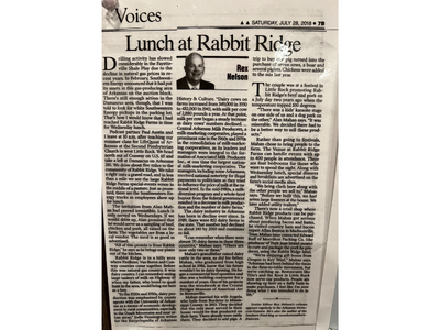 Newspaper article titled “Lunch at Rabbit Ridge” with a small portrait and dense columns of text