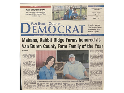 Newspaper front page with headline about Mahans, Rabbit Ridge Farms honored as Van Buren County Farm Family of the Year
