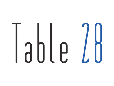 Table 28 logo in black and blue text on a white background