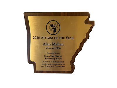 Gold plaque trophy reading “2020 Alumni of the Year” with engraved name