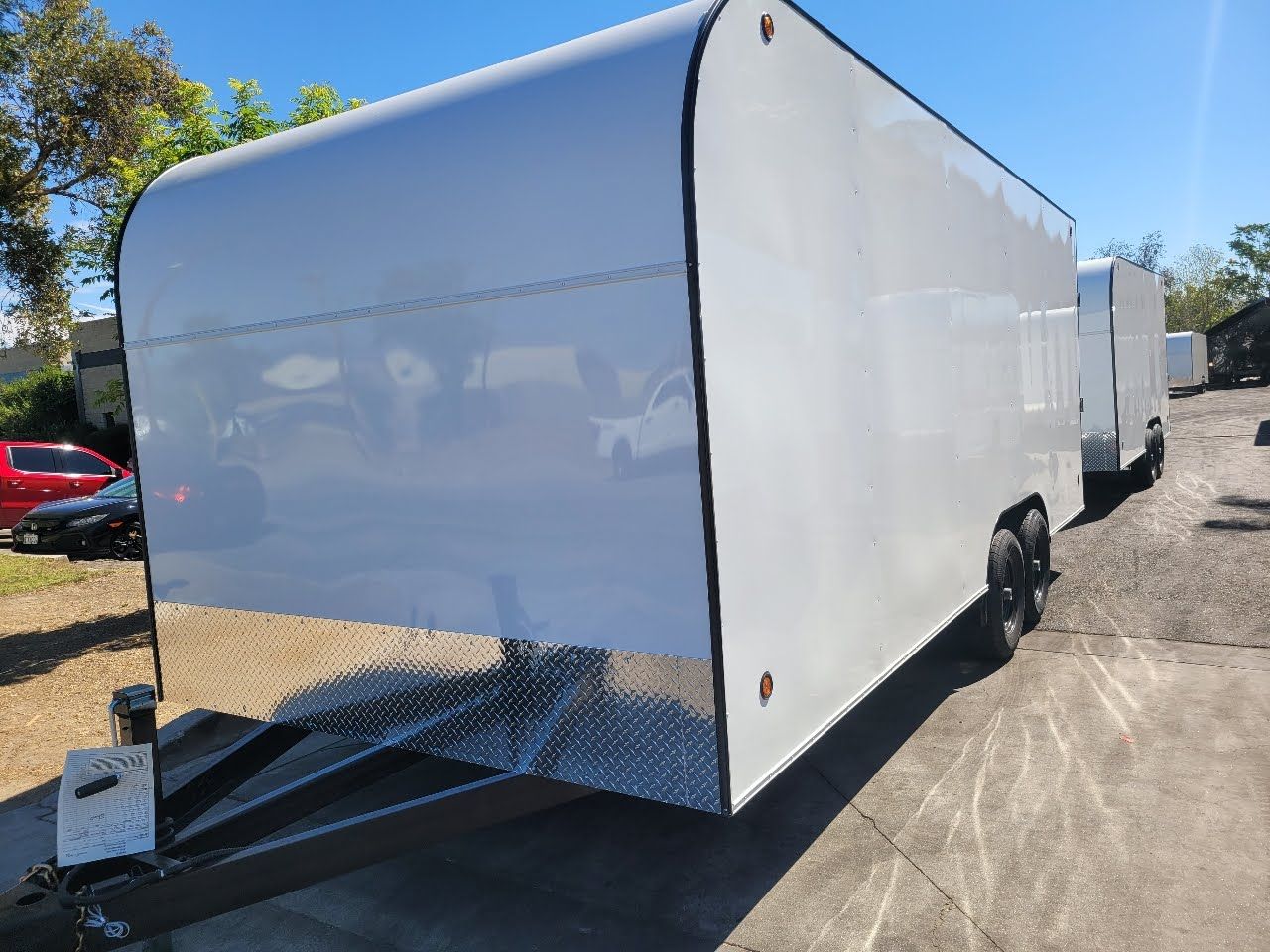 White Enclosed Trailer Front Left Side View