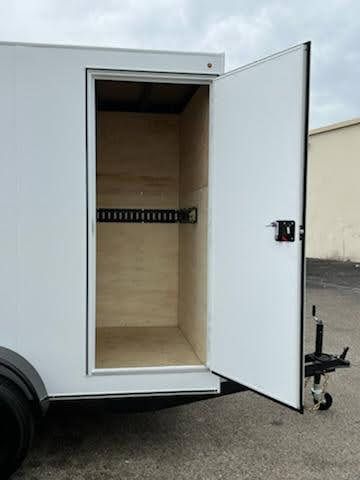 Short White Enclosed Trailers Side View Door Opened