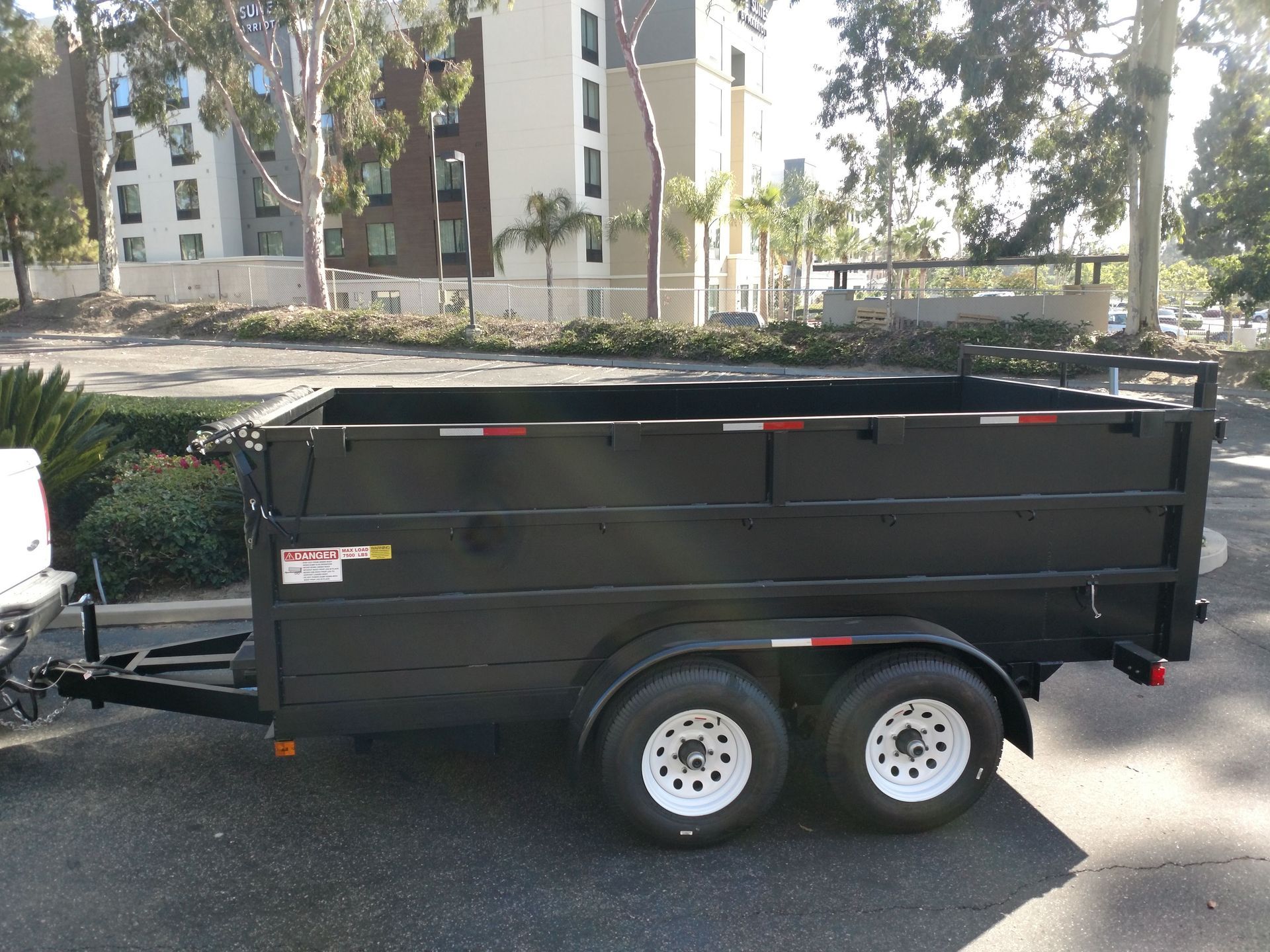 Towed Side View Of Dump Truck