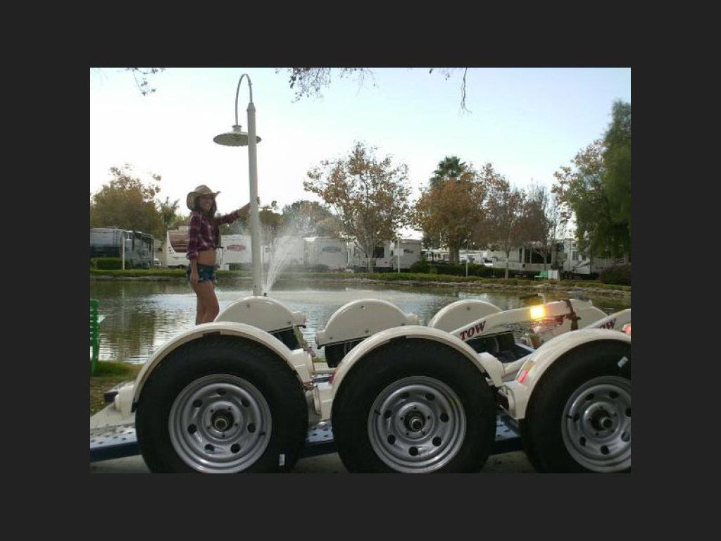 Parked Side View Tow Dollies Closeup