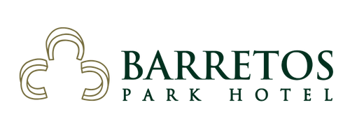 Logotipo do Barretos Park Hotel: emblema floral abstrato em tons creme à esquerda, texto verde à direita.