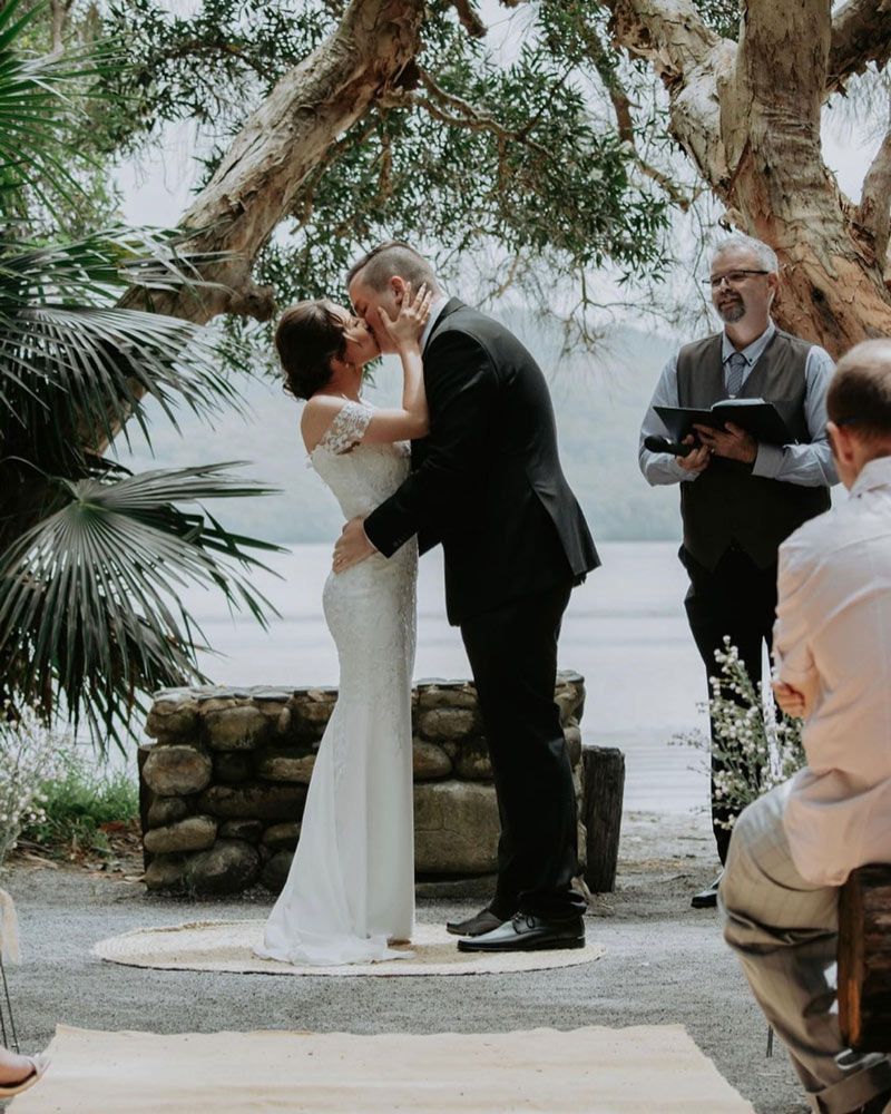 Groom Kissing The Bride — Celebrant in Hallidays Point, NSW