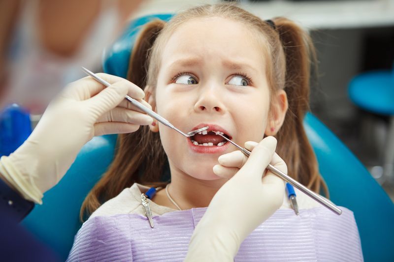 Preventing Childhood Cavities: The Benefits of Dental Sealants for Kids' Teeth