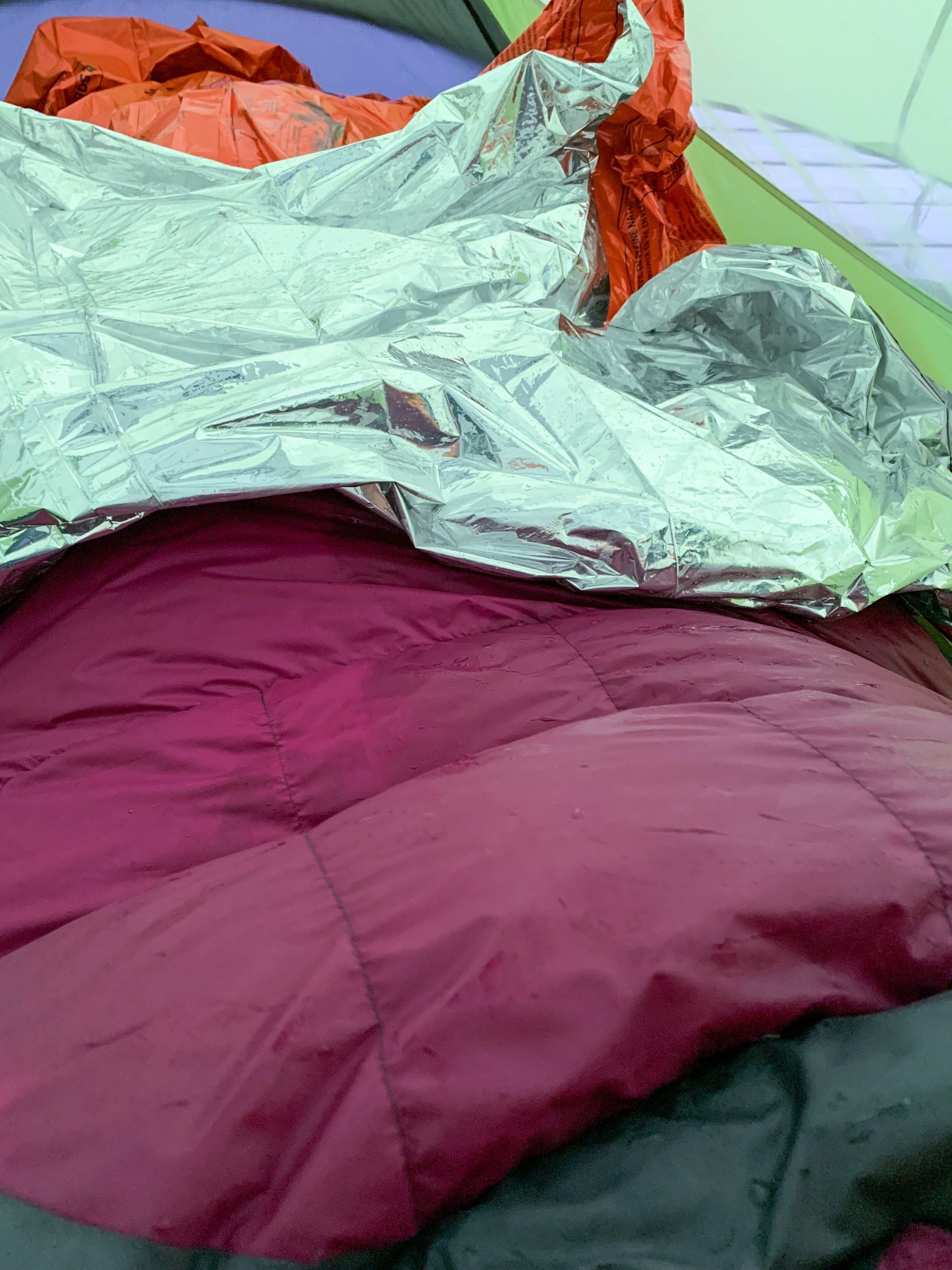 my sleeping system for backpacking - condensation on the sleeping pag from using emergency blanket