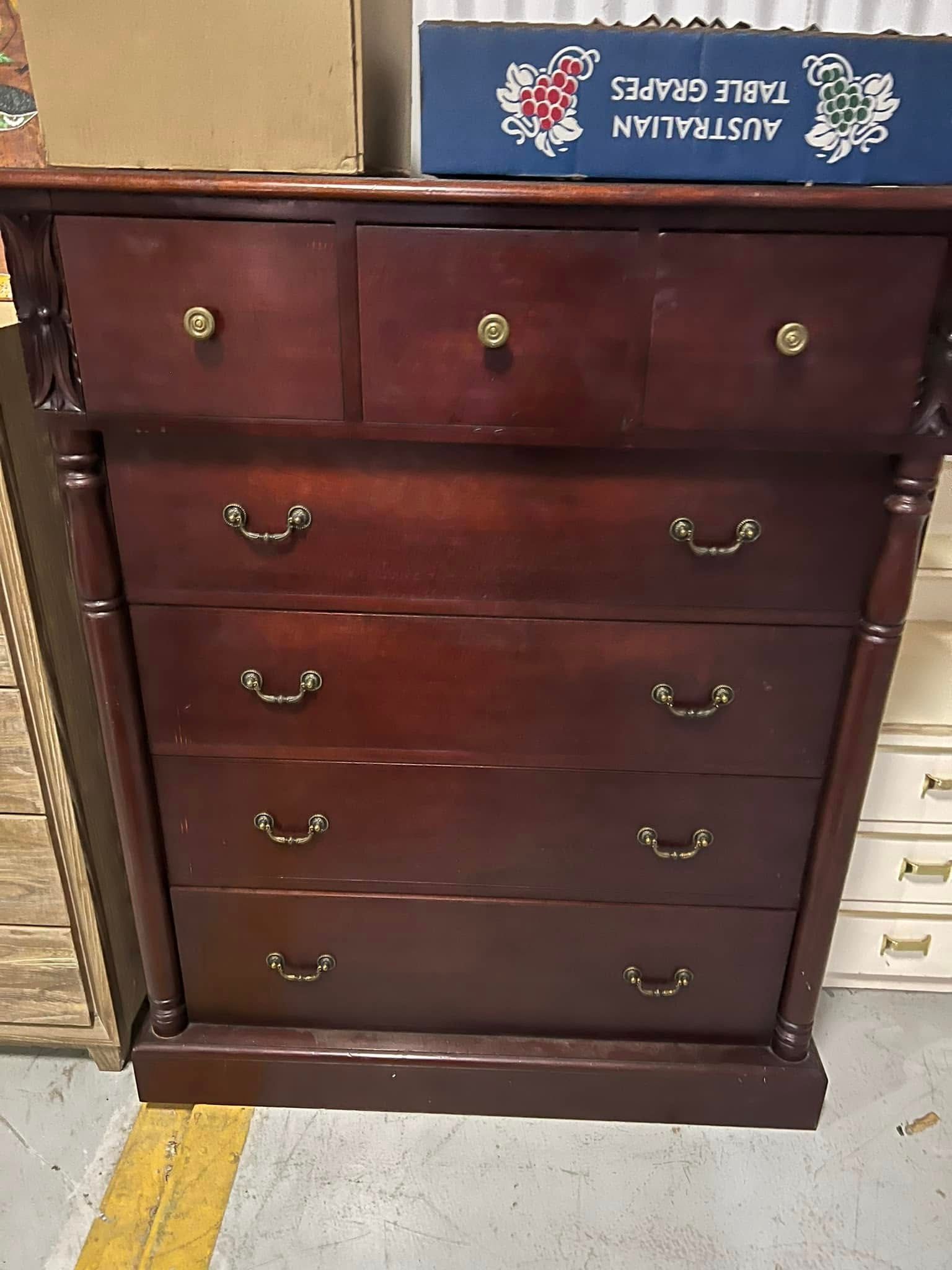 A Wooden Chest of Drawers With a Box on Top of It — Anton's New & Used Furniture In Ciccone, NT