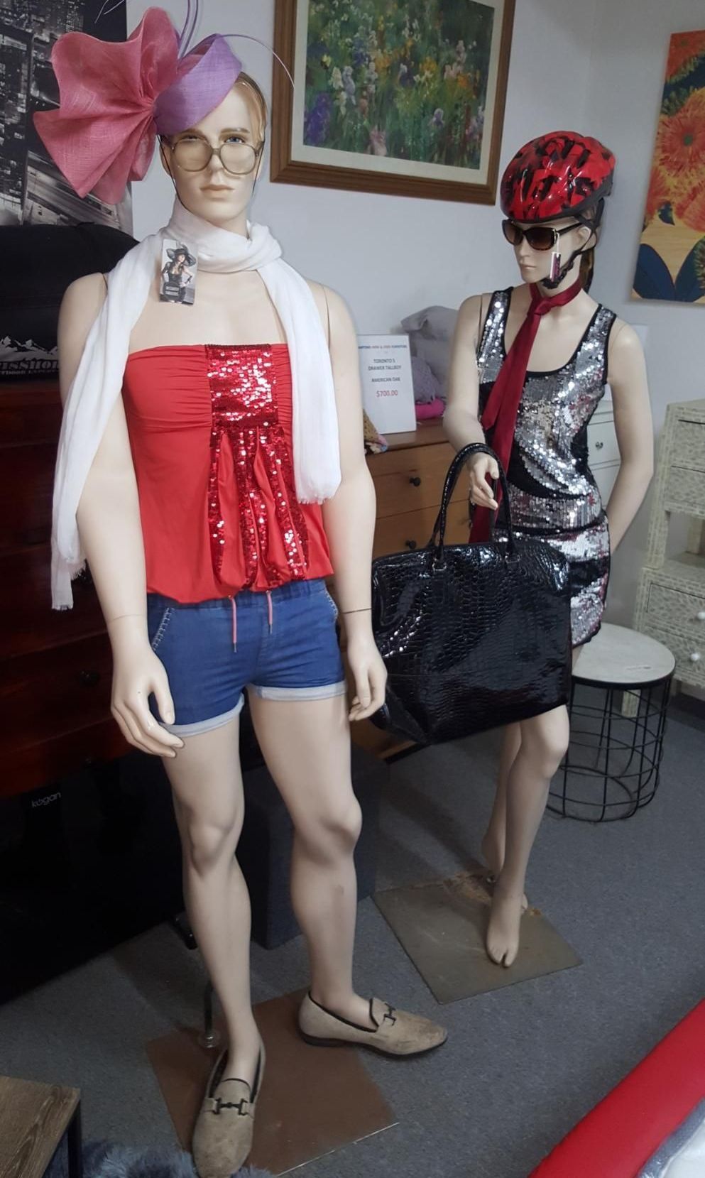 Two Mannequins Are Standing Next To Each Other In A Room — Anton's New & Used Furniture In Ciccone, NT