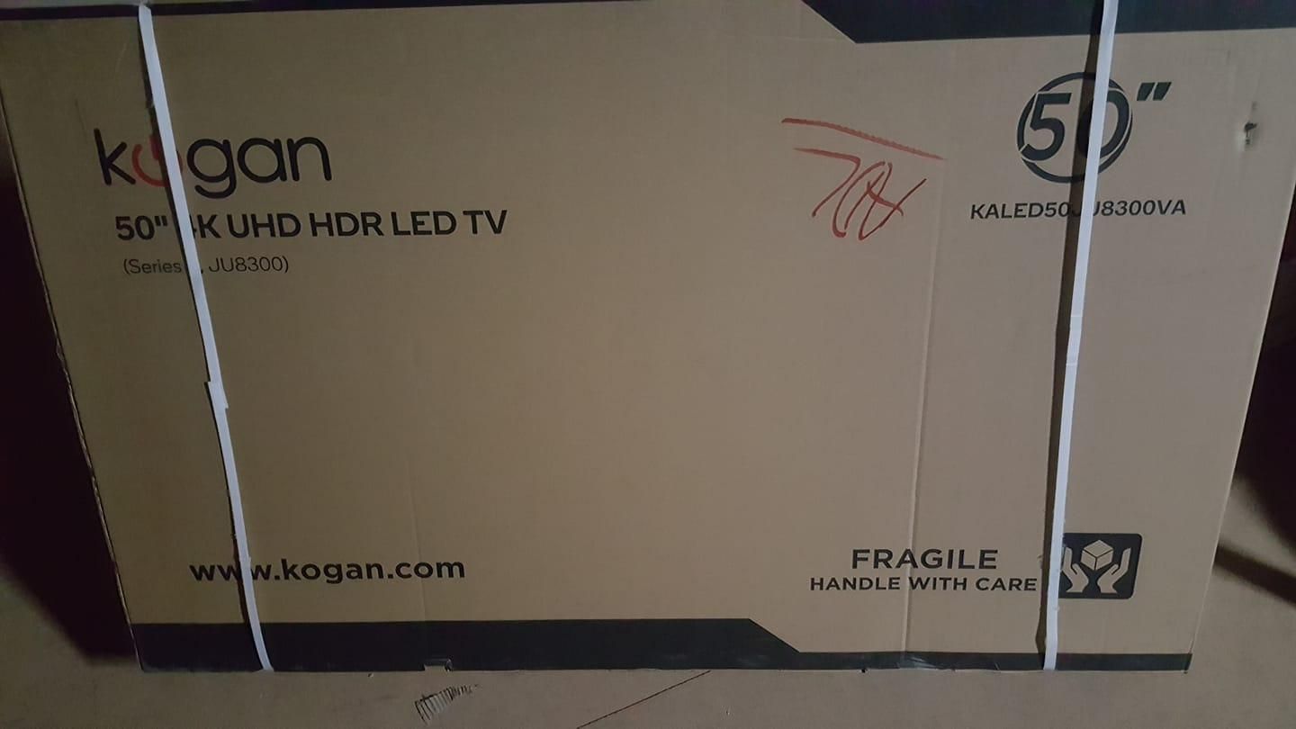 A Cardboard Box With A TV Inside Of It — Anton's New & Used Furniture In Ciccone, NT