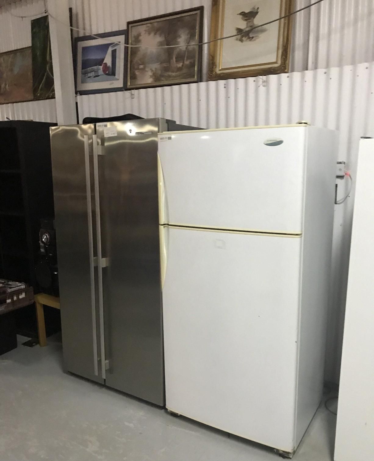 Two Refrigerators Are Sitting Next To Each Other In A Room — Anton's New & Used Furniture In Ciccone, NT