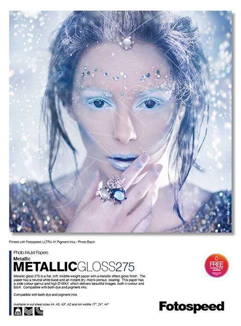 A poster of a woman with metallic gloss 275 on it
