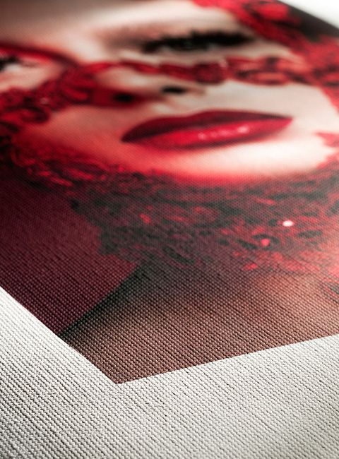 A close up of a piece of paper with a picture of a woman 's face on it.