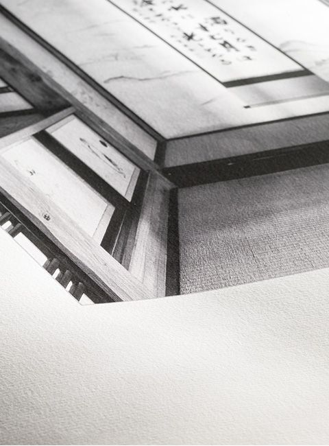 A black and white photo of a piano keyboard