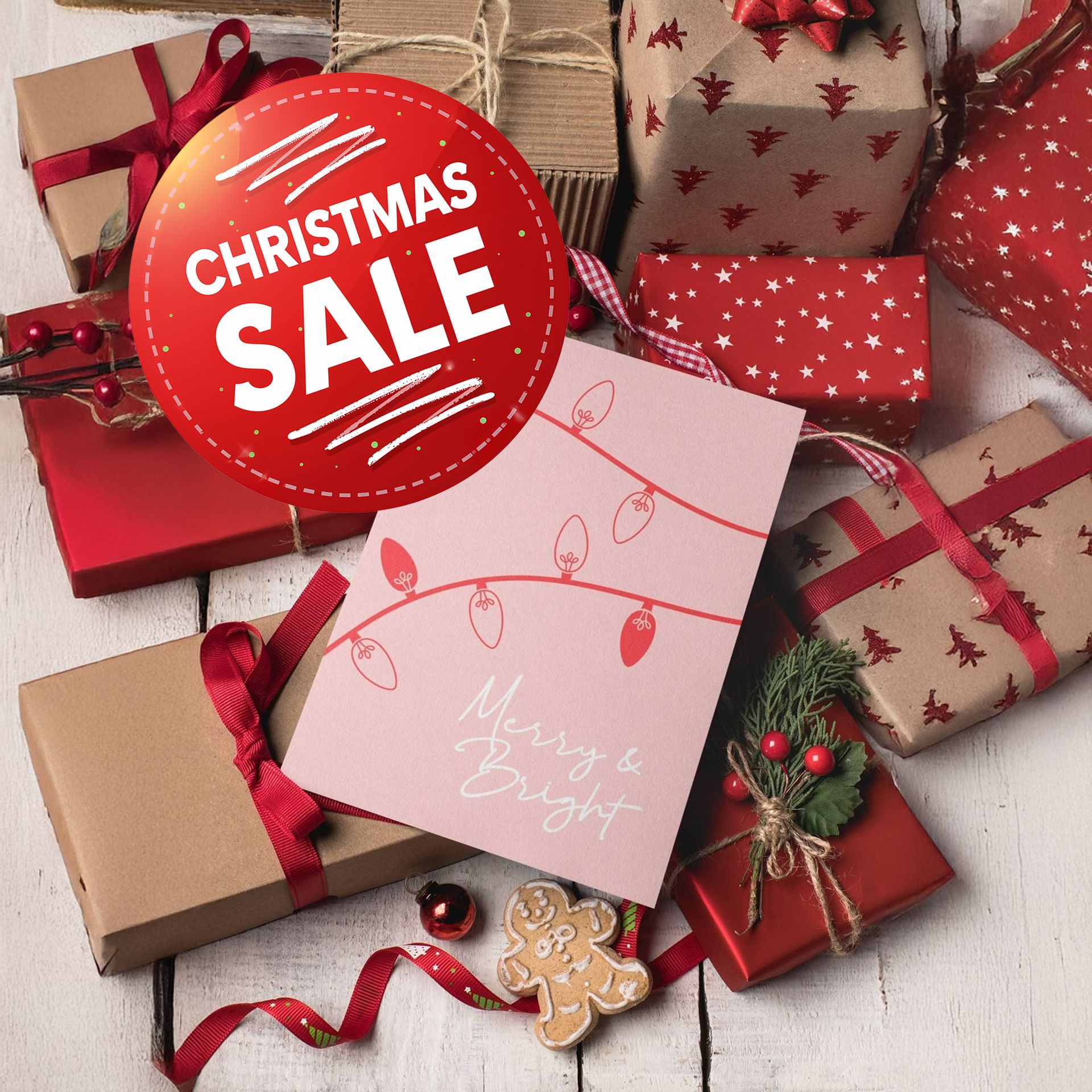 A bunch of cards and envelopes on a table with a plant and pencils