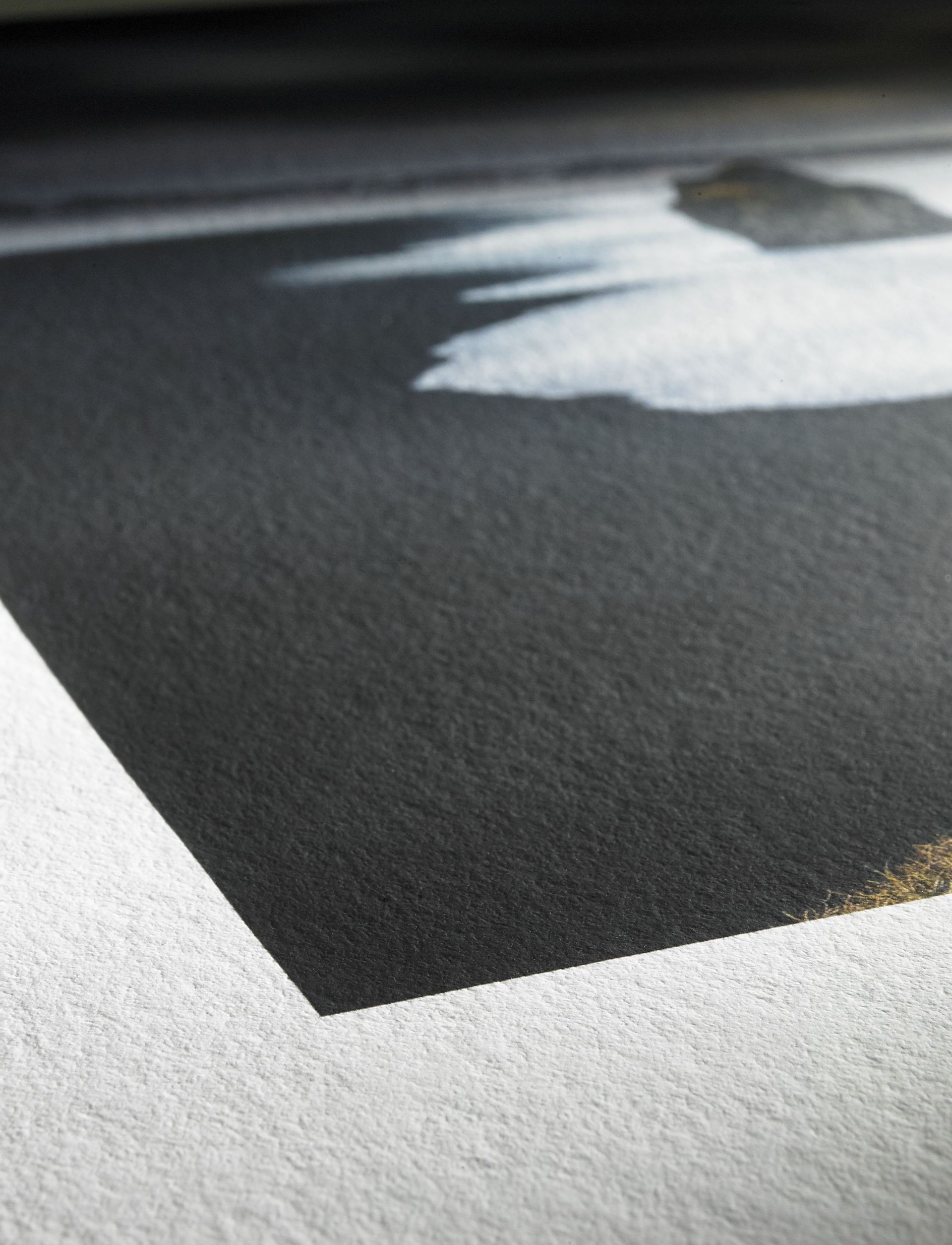 A close up of a painting of a person laying on a couch.
